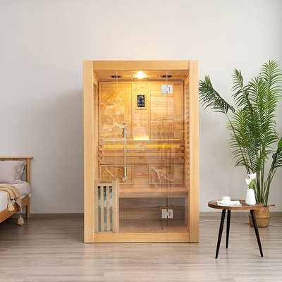 2 personnes utilisent le sauna à vapeur traditionnel d'intérieur en bois de pruche du Canada pour la maison