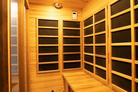 Pièce infrarouge lointaine en bois solide d'intérieur de sauna de carbone de 4 personnes avec la porte en verre