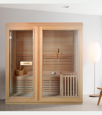 Sauna à vapeur traditionnelle à l'intérieur avec poêle et pierre
